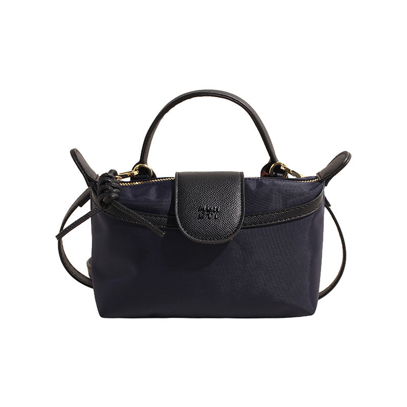 JM-1451 复古时尚百搭 新款小众女包单肩斜挎手拎感尼龙饺子包